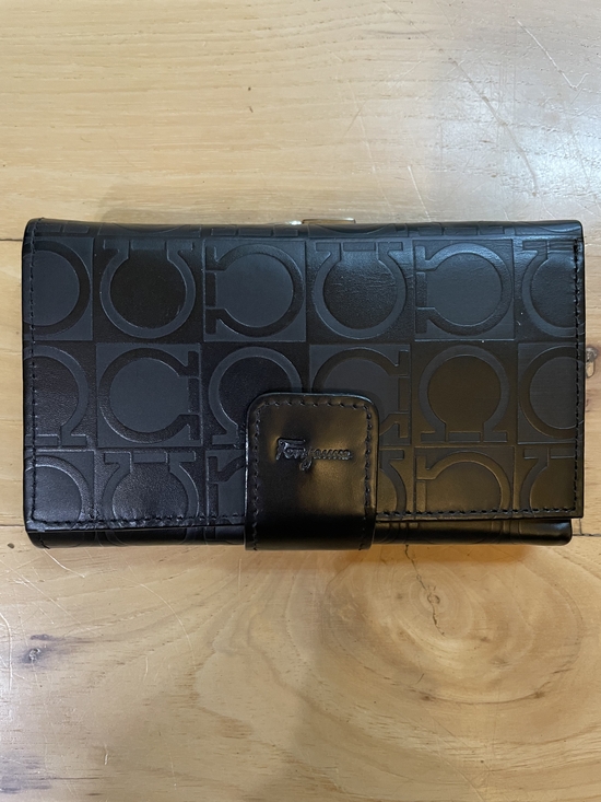 Salvatore Ferragamo Handbags - Salvatore Ferragamo Black Gancini Embossed Leather Wallet